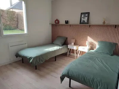 Un ou plusieurs lits dans un hébergement de l'établissement Gîte de la Sée
