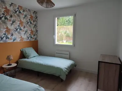 Un ou plusieurs lits dans un hébergement de l'établissement Gîte de la Sée