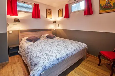 Un ou plusieurs lits dans un hébergement de l'établissement La Plus Petite Maison De France
