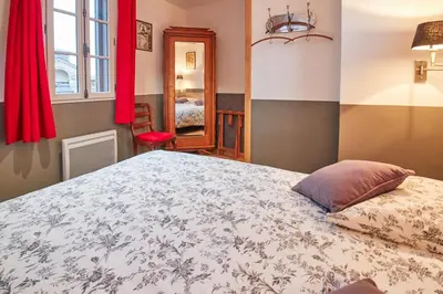 Un ou plusieurs lits dans un hébergement de l'établissement La Plus Petite Maison De France