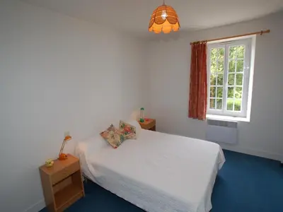 Un ou plusieurs lits dans un hébergement de l'établissement Normandy Family Escape