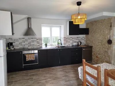 Cuisine ou kitchenette dans l'établissement House near Bayeux