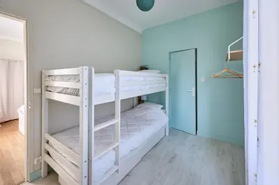 Un ou plusieurs lits dans un hébergement de l'établissement Landemer - A 700 m de la plage