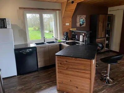 Cuisine ou kitchenette dans l'établissement L hirondelle