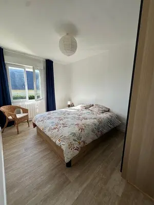 Un ou plusieurs lits dans un hébergement de l'établissement Maison face à la mer
