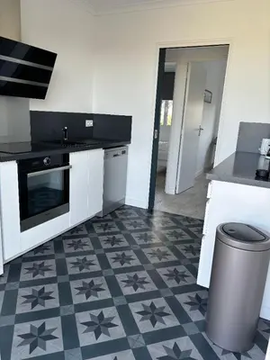 Cuisine ou kitchenette dans l'établissement villa Charlotte