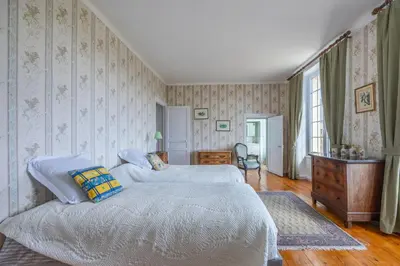 Un ou plusieurs lits dans un hébergement de l'établissement Le Cottage de Marguerite
