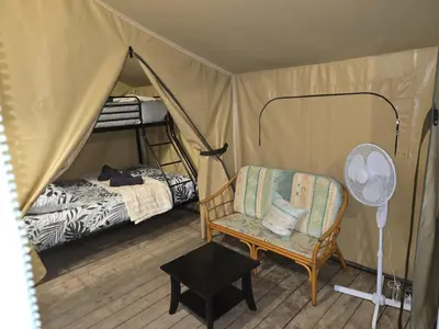 Un ou plusieurs lits dans un hébergement de l'établissement Clos des Monts Tente Lodge Safari J