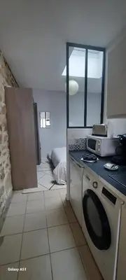 Cuisine ou kitchenette dans l'établissement appartement centre ville