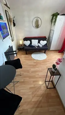 Coin salon dans l'établissement Pause détente à Cabourg