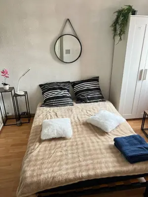Un ou plusieurs lits dans un hébergement de l'établissement Pause détente à Cabourg