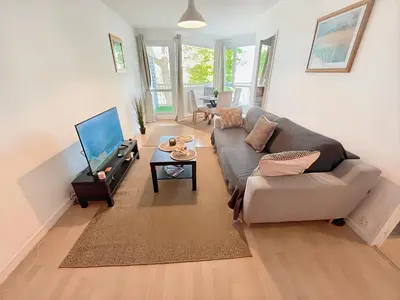 Coin salon dans l'établissement Appartement à 10 minutes à pied du centre ville avec parking privé et balcon
