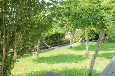 Jardin de l'établissement Charmant cottage normand avec vue panoramique sur la côte de Regnéville