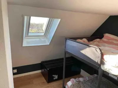 Un ou plusieurs lits dans un hébergement de l'établissement Magnifique appartement avec mezzanine prés Thalasso