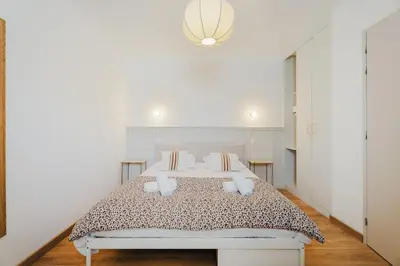 Un ou plusieurs lits dans un hébergement de l'établissement La Baie - Appartement de charme entièrement équipé à 5min du Mont St Michel