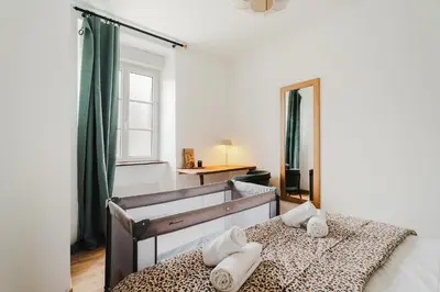 Un ou plusieurs lits dans un hébergement de l'établissement La Baie - Appartement de charme entièrement équipé à 5min du Mont St Michel