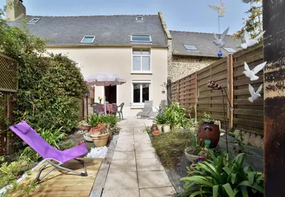 Jardin de l'établissement Maisonnette Les Agapanthes de Cancale 23 personne