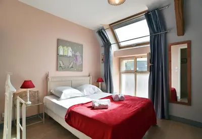 Un ou plusieurs lits dans un hébergement de l'établissement Maisonnette Les Agapanthes de Cancale 23 personne