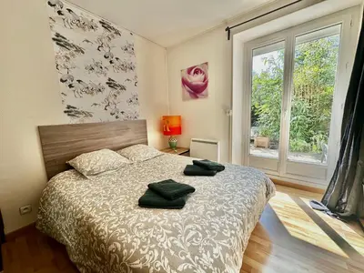 Un ou plusieurs lits dans un hébergement de l'établissement Appart' Basly - avec terrasse à 7km des plages
