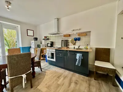 Cuisine ou kitchenette dans l'établissement Appart' Basly - avec terrasse à 7km des plages