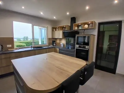 Cuisine ou kitchenette dans l'établissement natura