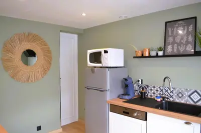 Cuisine ou kitchenette dans l'établissement Au Bord de L'Ô