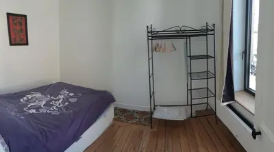 Un ou plusieurs lits dans un hébergement de l'établissement Maison de charme face au Canal