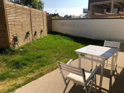 Jardin de l'établissement Appartement Verson