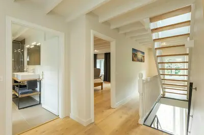 Un ou plusieurs lits dans un hébergement de l'établissement Renovated Stone House In Normandy