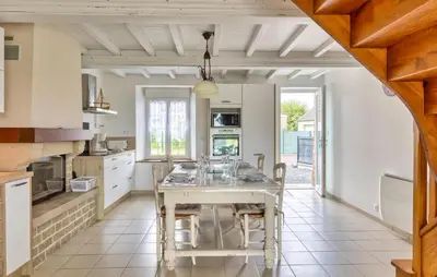 Cuisine ou kitchenette dans l'établissement Maison Proche Mer