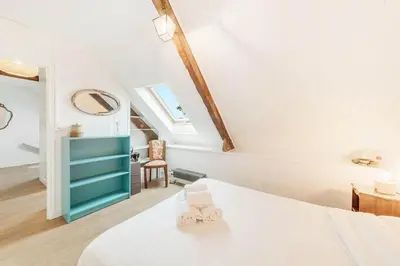 Un ou plusieurs lits dans un hébergement de l'établissement La Bisquine - Maison 3 chambres - Jardin clos