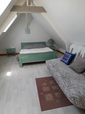 Un ou plusieurs lits dans un hébergement de l'établissement Chambre sérénité