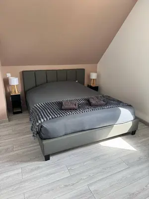 Un ou plusieurs lits dans un hébergement de l'établissement Maison des Laquais