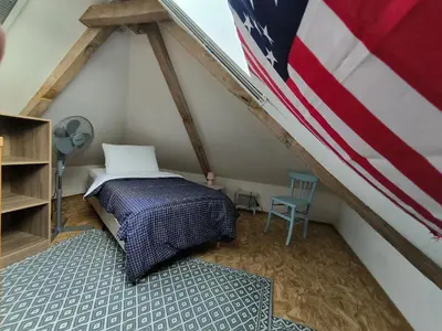 Un ou plusieurs lits dans un hébergement de l'établissement GITE A THEME D-DAY - situé à 15mn d'Omaha Beach - Animaux OK - Terrain clos - Aucuns voisins - WIFI