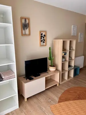 Télévision ou salle de divertissement dans l'établissement Votre évasion au bord de mer