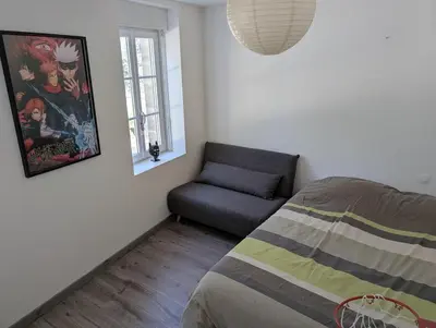 Un ou plusieurs lits dans un hébergement de l'établissement Maison agréable au coeur de Bayeux !