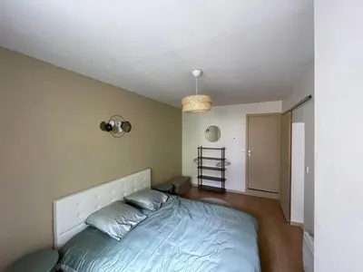 Un ou plusieurs lits dans un hébergement de l'établissement Appartement moderne & pittoresques
