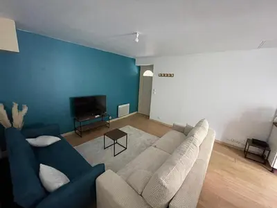 Télévision ou salle de divertissement dans l'établissement Appartement moderne & pittoresques