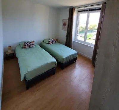 Un ou plusieurs lits dans un hébergement de l'établissement L'Évasion Maison typique de mineur