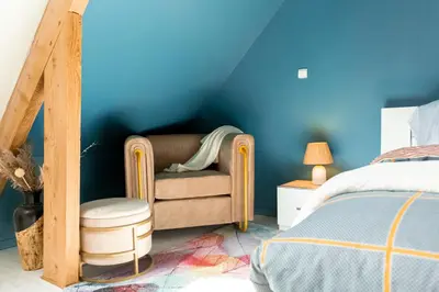 Un ou plusieurs lits dans un hébergement de l'établissement Loft tout confort avec parking et à moins 15 min Caen et des Plages