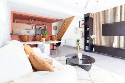 Télévision ou salle de divertissement dans l'établissement Loft tout confort avec parking et à moins 15 min Caen et des Plages