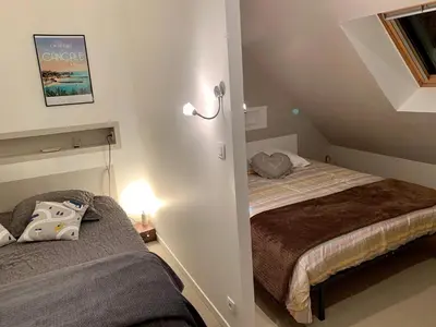 Un ou plusieurs lits dans un hébergement de l'établissement Villa Noroit
