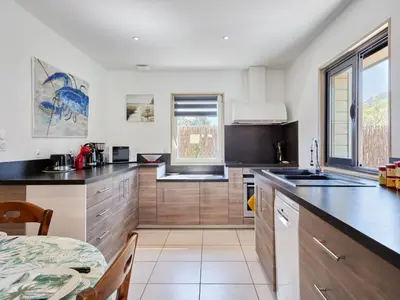 Cuisine ou kitchenette dans l'établissement Holiday Home Chez Boubou by Interhome