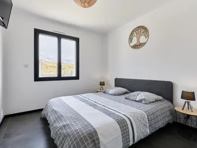 Un ou plusieurs lits dans un hébergement de l'établissement Holiday Home Manonga by Interhome