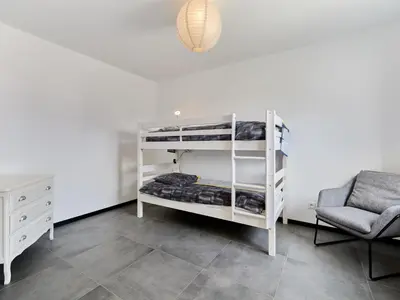 Un ou plusieurs lits dans un hébergement de l'établissement Holiday Home Manonga by Interhome