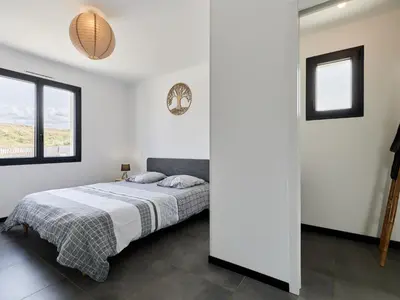 Un ou plusieurs lits dans un hébergement de l'établissement Holiday Home Manonga by Interhome
