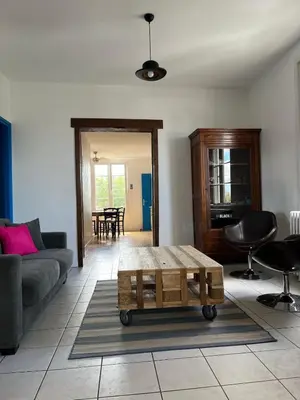 Coin salon dans l'établissement Maison 6-8 personnes, vélos inclus, à 5 min de la gare