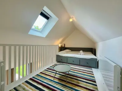 Un ou plusieurs lits dans un hébergement de l'établissement La maison de l'Orangerie - Charm & comfort in the very heart of Carentan