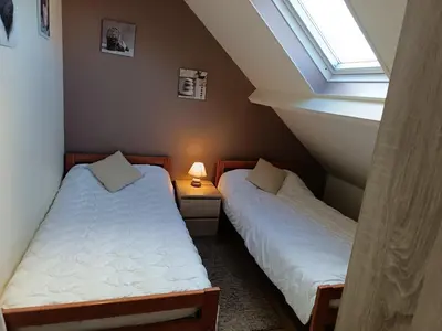 Un ou plusieurs lits dans un hébergement de l'établissement Gîte de la mouette