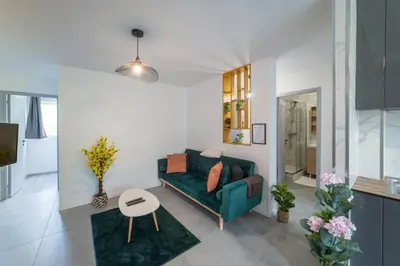 Coin salon dans l'établissement Spacieux Appartement 4 Chambres